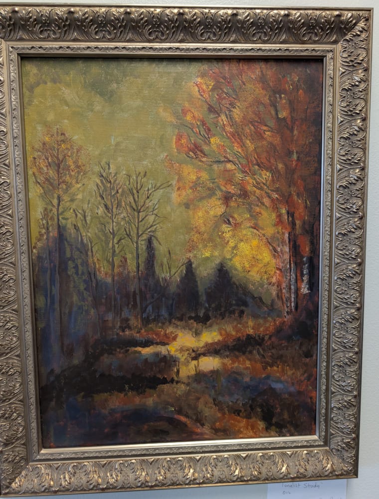 Oil painting of a woods scene in fall.