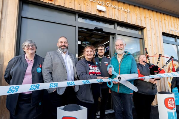 A Humpback in Loch Broom and Co-op opens