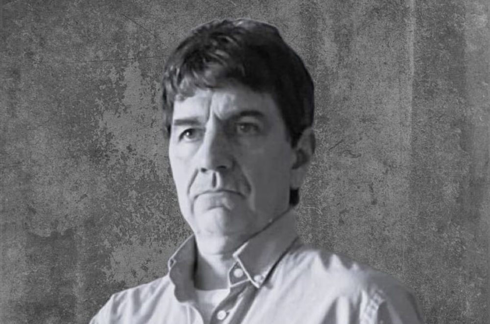 This author photo is a mirror image taken on June 19th, 2025.