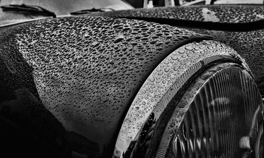 Volkswagen Karmann Ghia after rain, water beading.