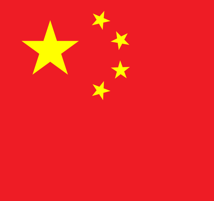National flag of China: red field with one large yellow star and four smaller yellow stars.