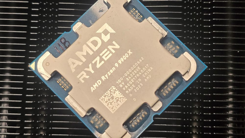 A picture of an AMD Ryzen 9 9900X on a heatsink