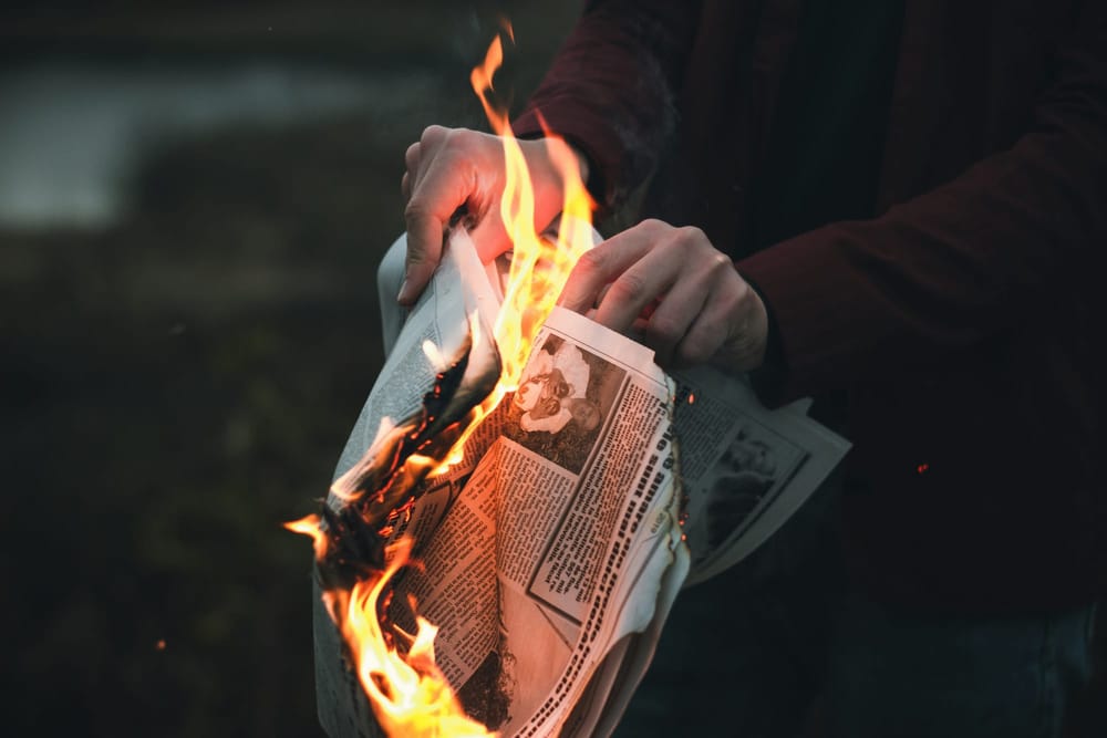 newspaper burning
